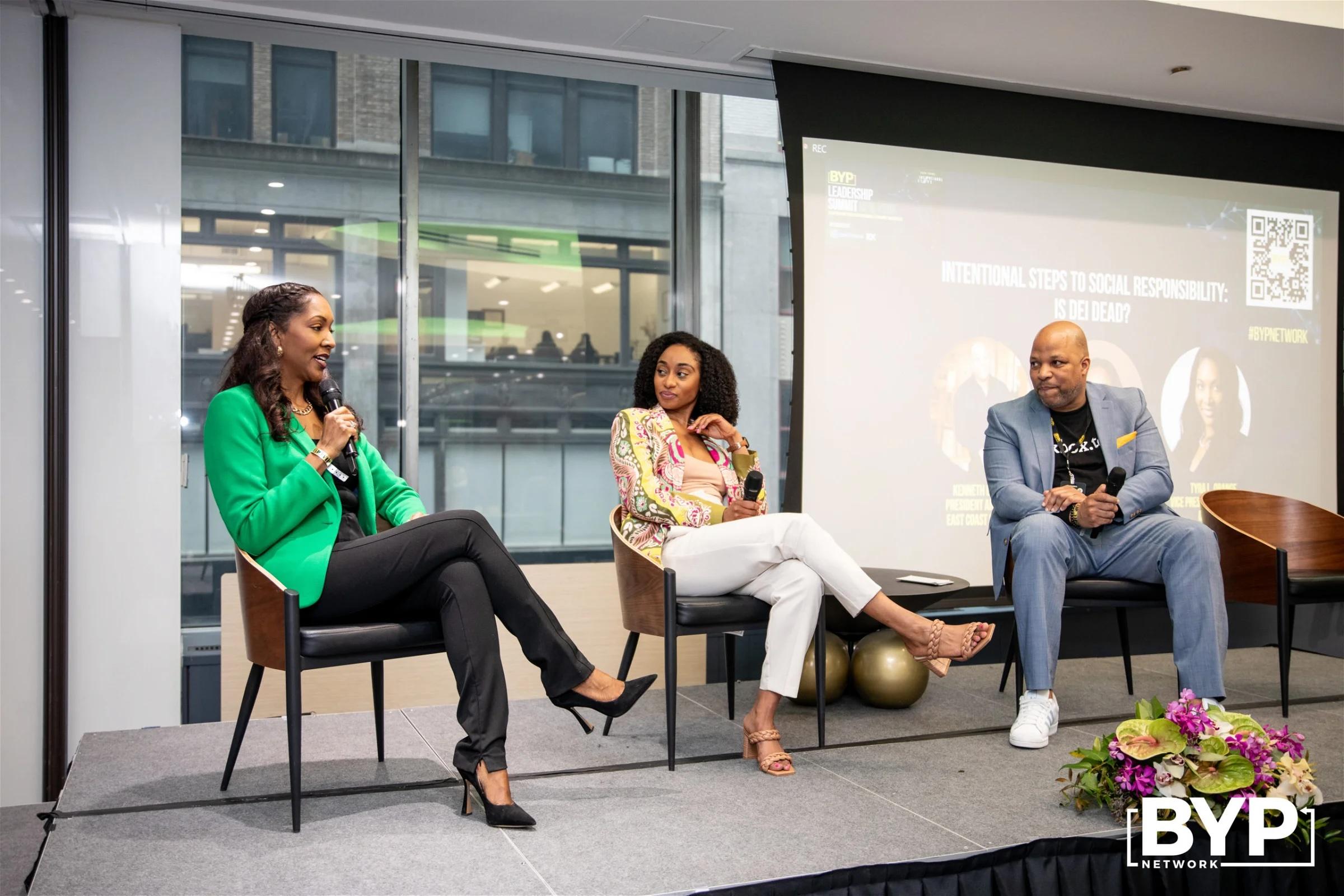 Adrienne at a leadership summit panel.